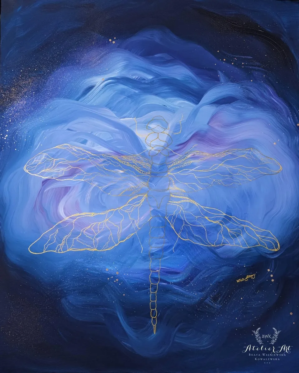 A blue dragonfly outlined in gold.